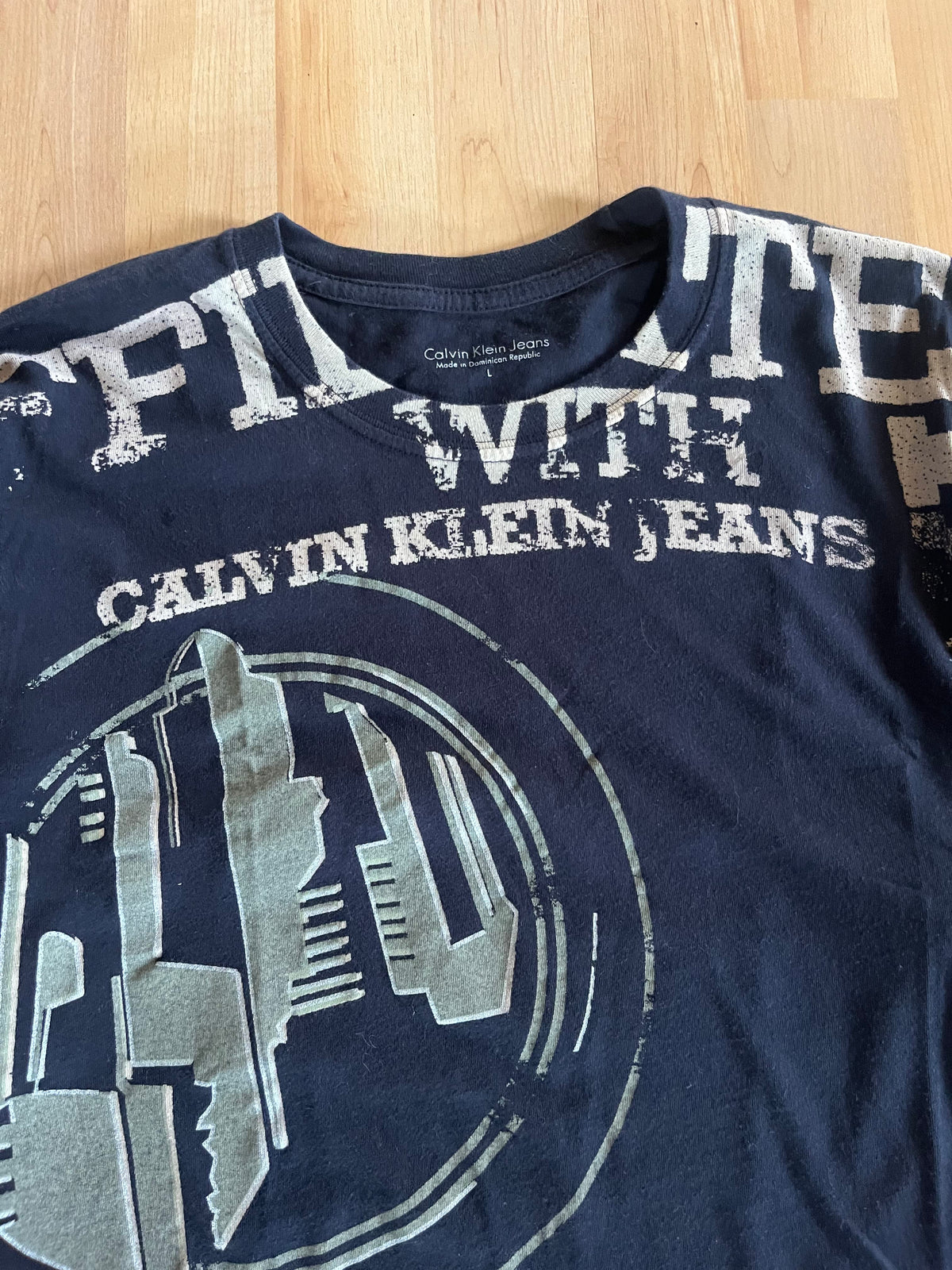00s Black Single Stitch Calvin Klein Jeans Silver Spellout Graphic T-Shirt